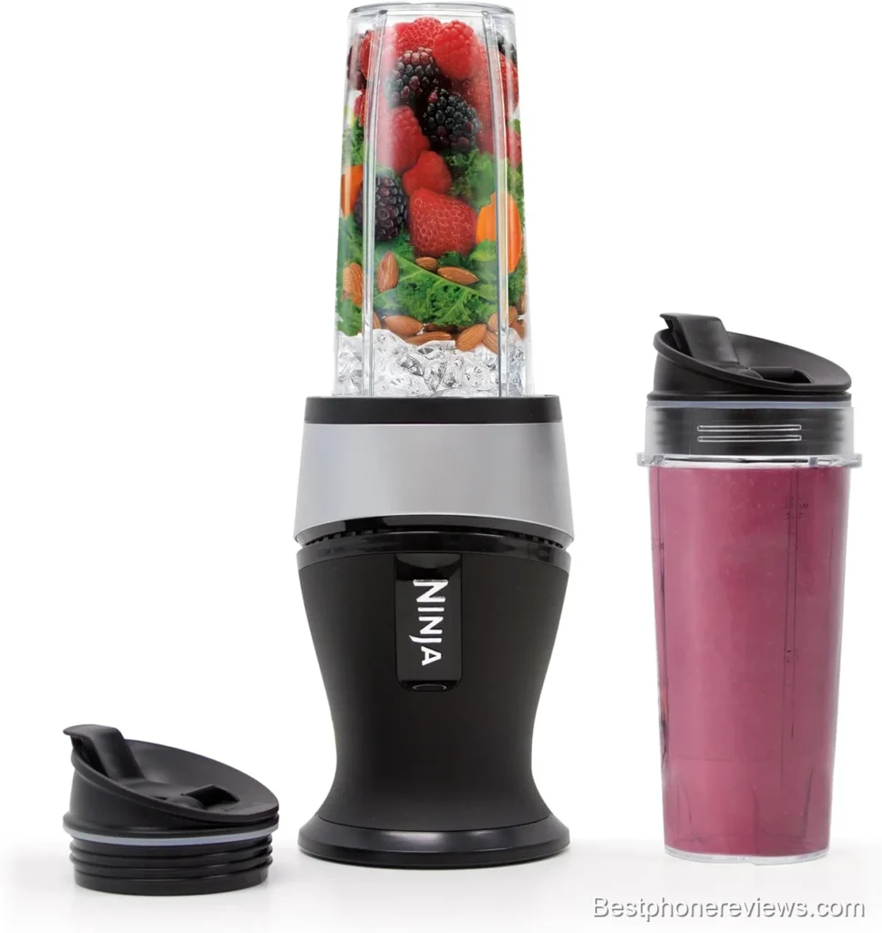 Ninja personal blender with fresh fruit and a smoothie cup.